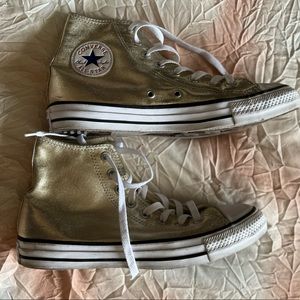 Gold high top converse